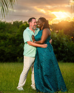 Elegant birthday photoshoot of a woman and husband in a flowing dress at Seascape Villa, St Croix
