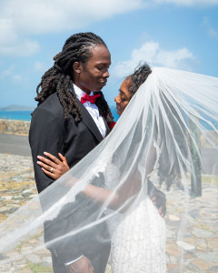 Bride and groom embracing each other at their wedding at Point Udall, St Croix