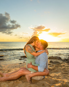 Couple sharing a hot kiss on the beach during sunset in St Croix