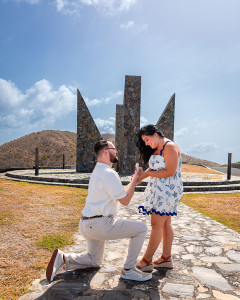He kneels on one to ask her to marry him at a surprise engagement photoshoot